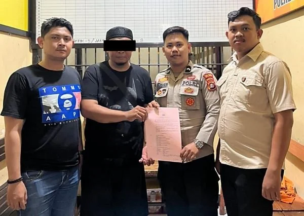 Dirut Perumda Aneka Usaha Majene saat ditahan oleh pihak Polres Majene (Dok : Ist).
