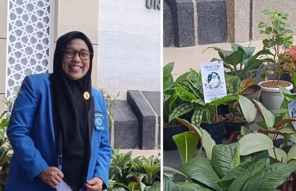 Anggota Dewan Perwakilan Rakyat Daerah (DPRD) Provinsi Sulawesi Selatan, Yeni Rahman saat Menerima Tanaman Hidup di Kelulusan Magister (Dok: Ist).
